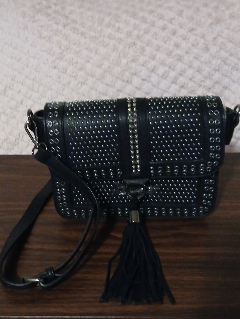 Studded Black Crossbody Bag with Tassel Accent